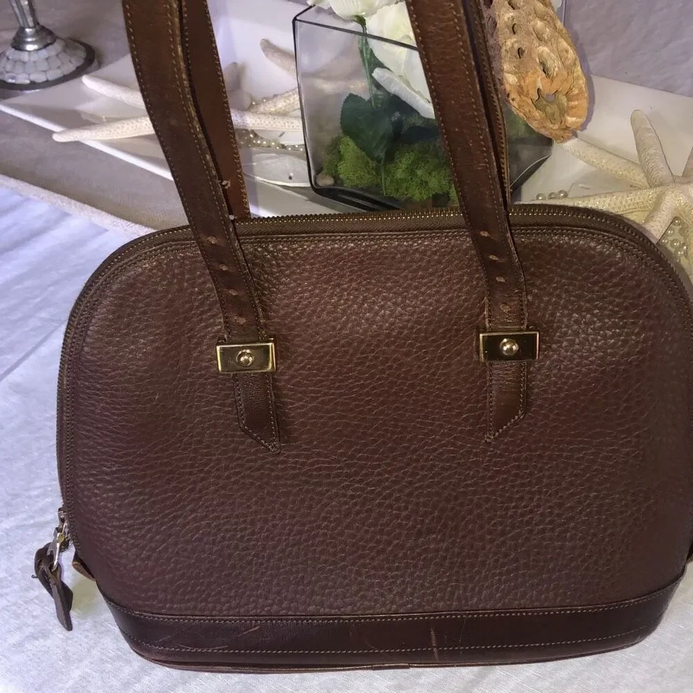 Dooney & Bourke brown pebbled leather handbag green interior